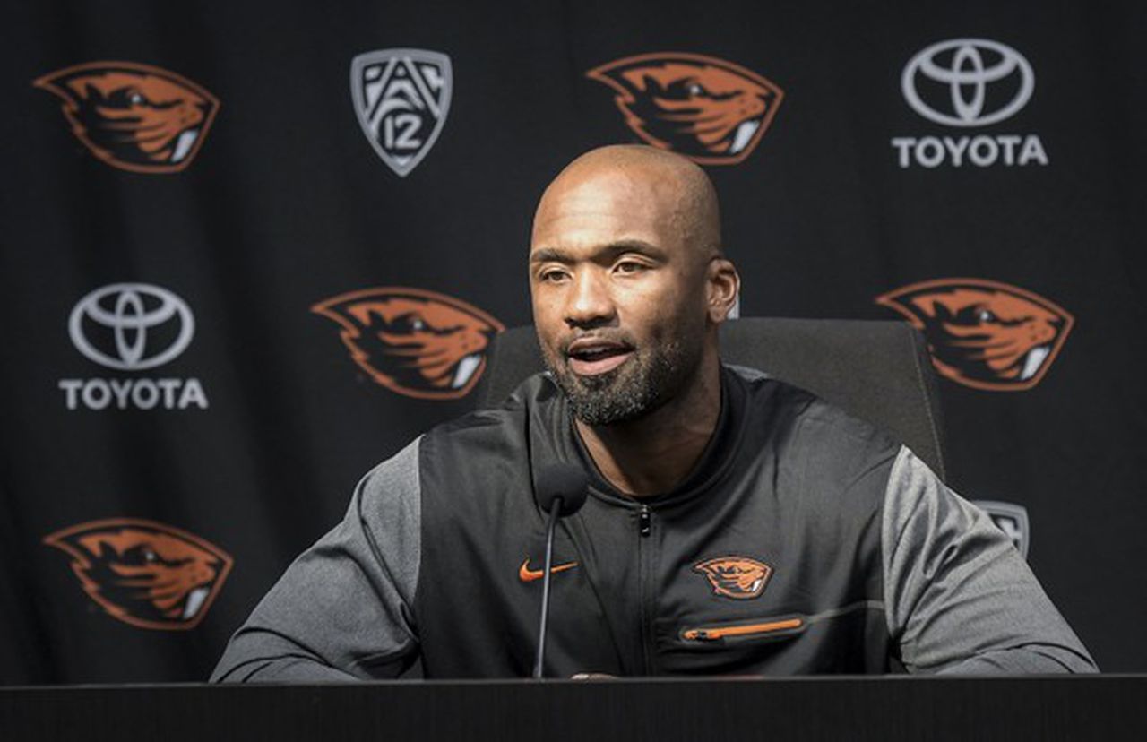 Photo of Cory Hall at news conference talking about being Oregon State interim head coach