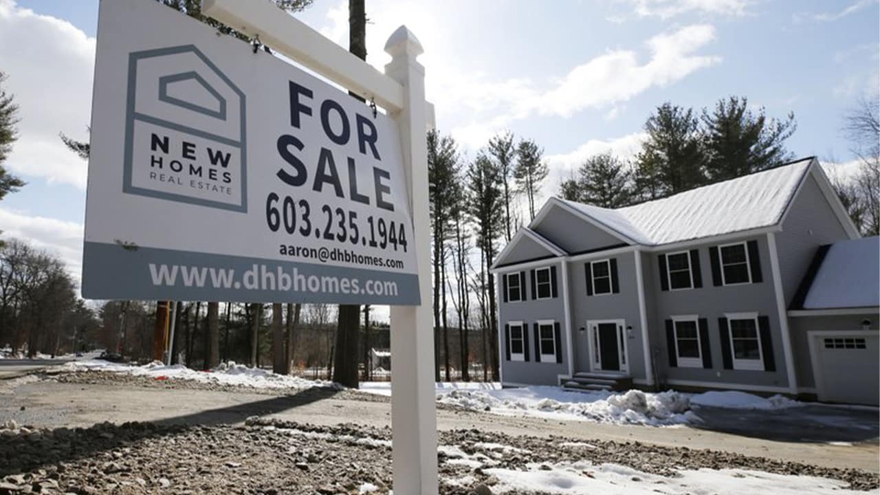 Photo of a for sale sign in front of a house in Londonderry