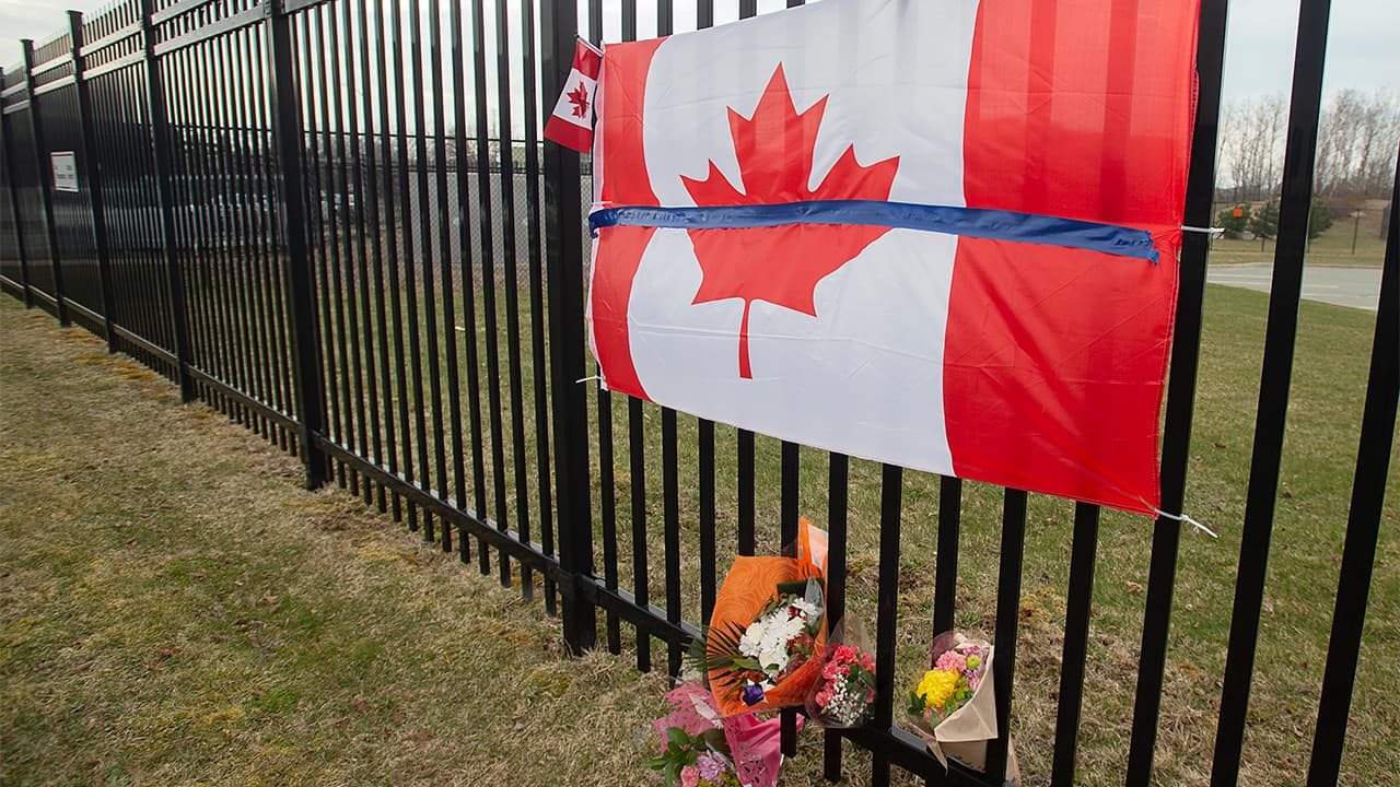 Photo of a Canadian flag at a tribute in Nova Scotia