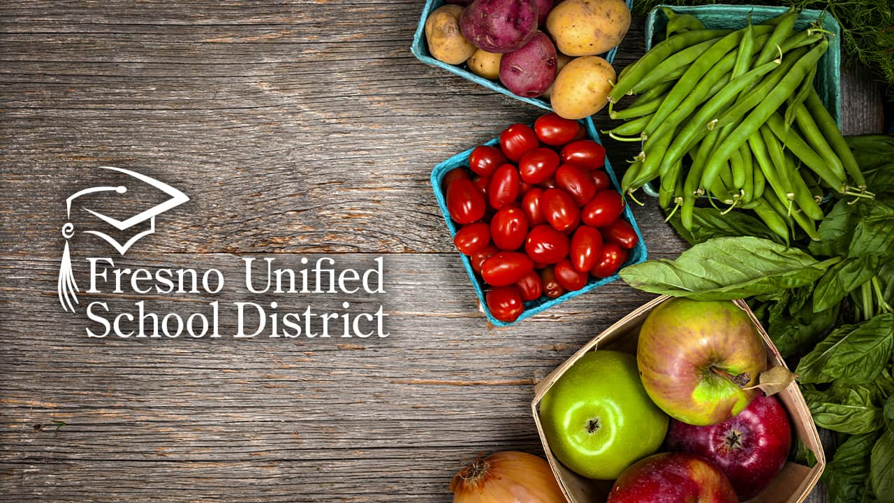 Composite image of Fresno Unified School District logo and assorted fresh fruits and vegetables