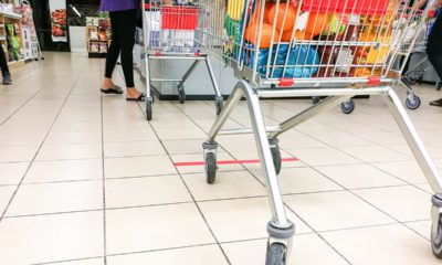 Photo of grocery baskets spaced apart to meet social distancing requirements