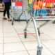 Photo of grocery baskets spaced apart to meet social distancing requirements