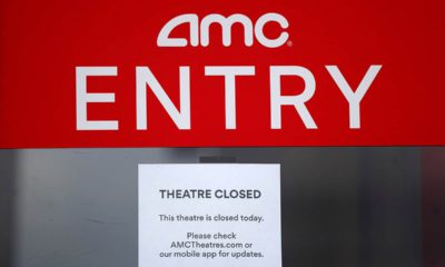 Photo of a closed sign at an AMC Theater
