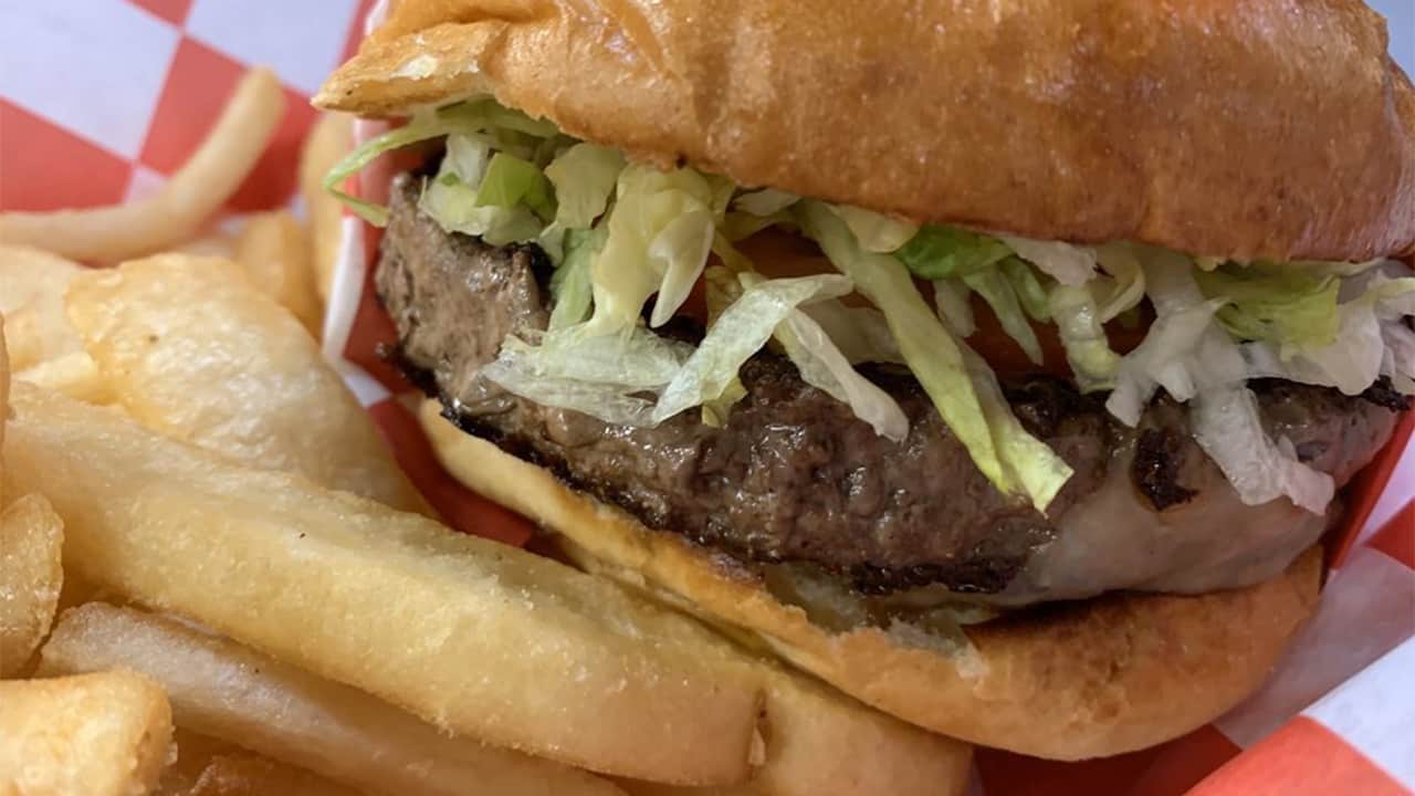 Photo of a hamburger and fries from Colorado Grill in Fresno, California