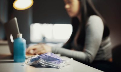 Photo of a female student doing classwork online during COVID-19