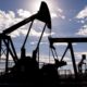 Photo of Kern County oil pumps set against a blue sky