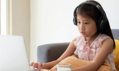 Photo of a young girl engaged in distance learning