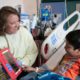 Photo of a child life team member and a Valley Children's Hospital patient