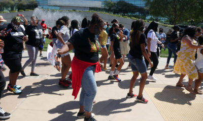 Image of residents dancing in front of Fresno City Hall after signing of Black Lives Matter Day proclamation