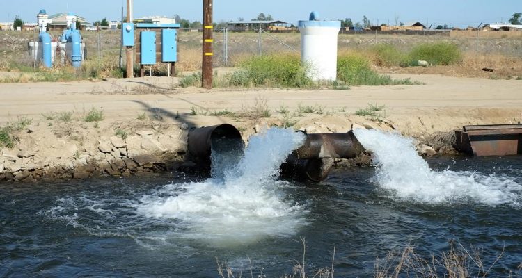 Photo of pumped groundwater flowing into a canal