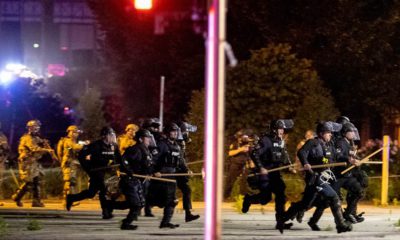 Photo of Louisville police and National Guard troops