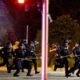 Photo of Louisville police and National Guard troops