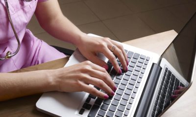 Photo of a nursing student working on a laptop