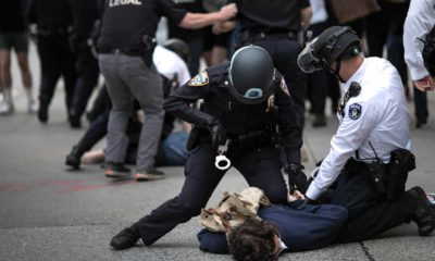 Photo of police arresting a protester in New York