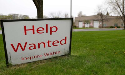 Photo of a help wanted sign