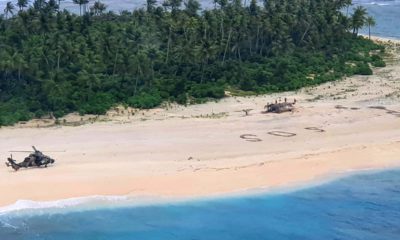 Photo of an Australian Army helicopter lands on Pikelot Island in the Federated States of Micronesia