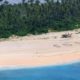 Photo of an Australian Army helicopter lands on Pikelot Island in the Federated States of Micronesia