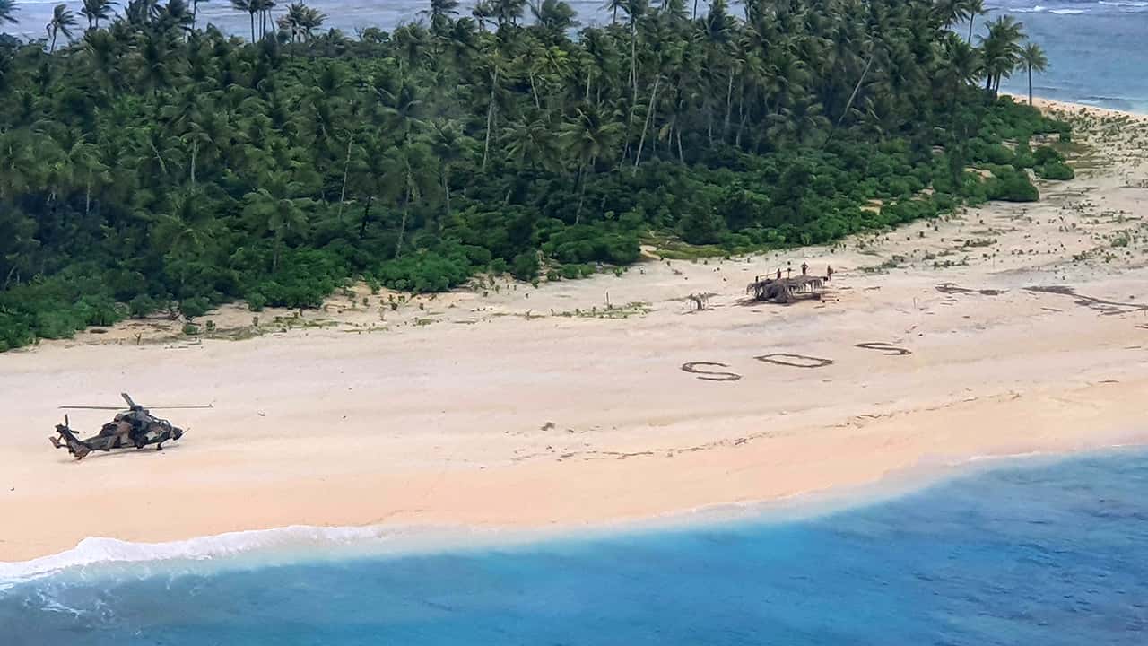 Photo of an Australian Army helicopter lands on Pikelot Island in the Federated States of Micronesia