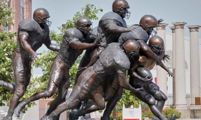 Photo of a statue of football players